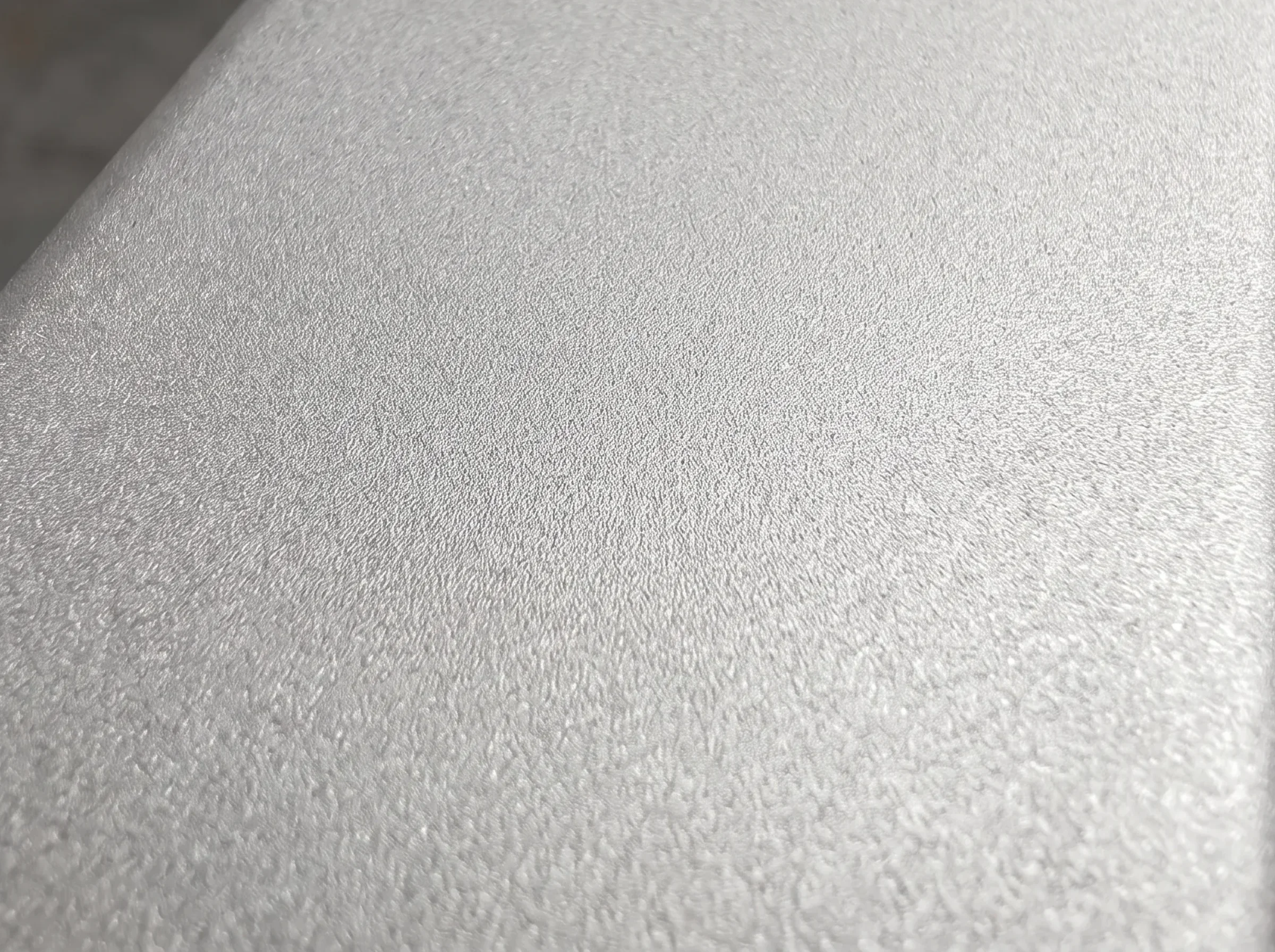 Nahaufnahme einer gestrahlten Aluminiumoberfläche